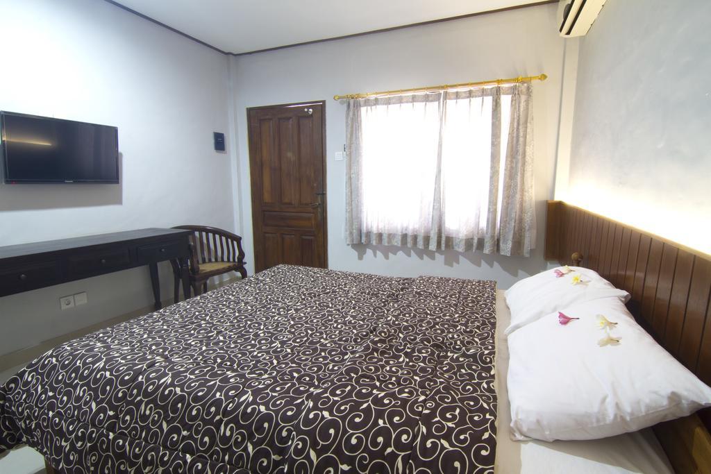 Agung And Sue Watering Hole I Hotel Sanur Quarto foto